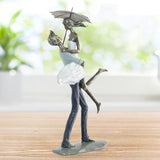 Lovers With Umbrella Figurine